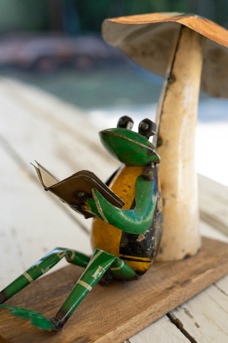 Recycled Iron Frog Leaning on a Mushroom